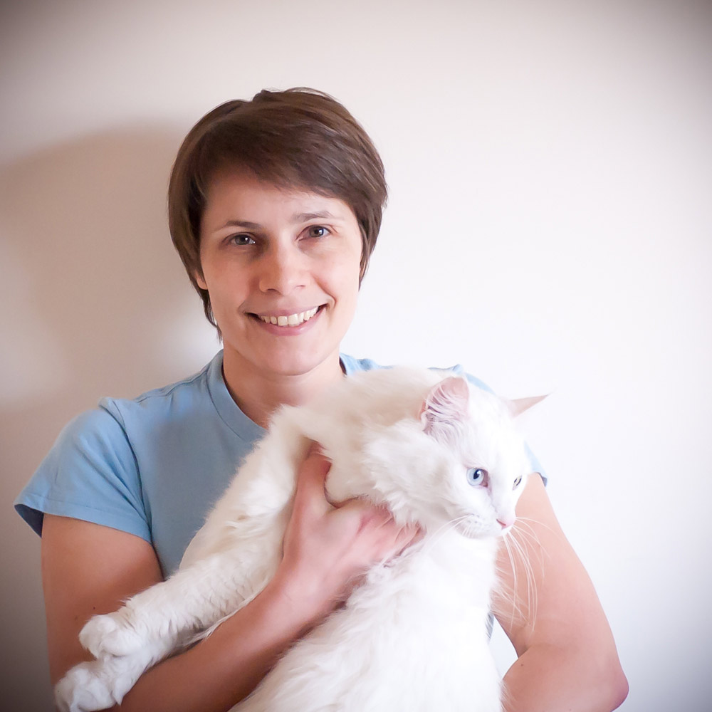 Ozzi Cat Magazine - Natalie Krotova - Founder and Editor-in-Chief with one of her cats (Musty)
