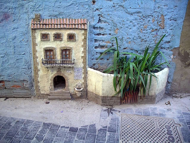 Cat house on a wall