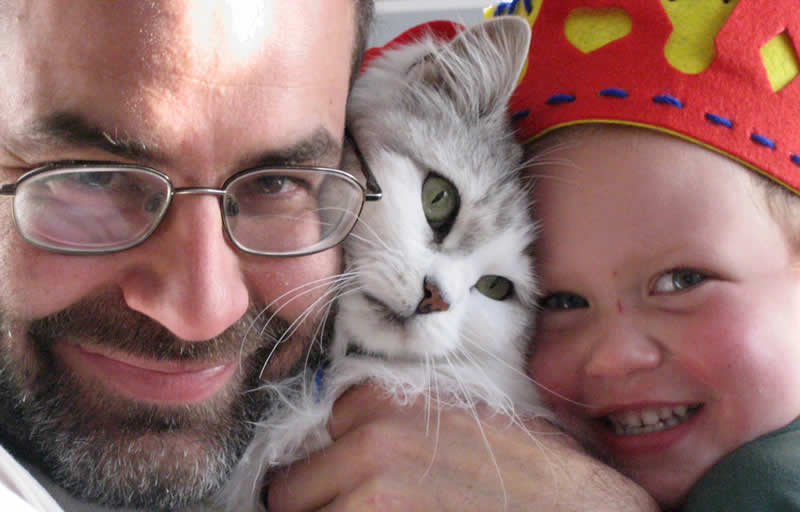 Family Cat - happy cat daddy with daughter and a grey and white cute cat